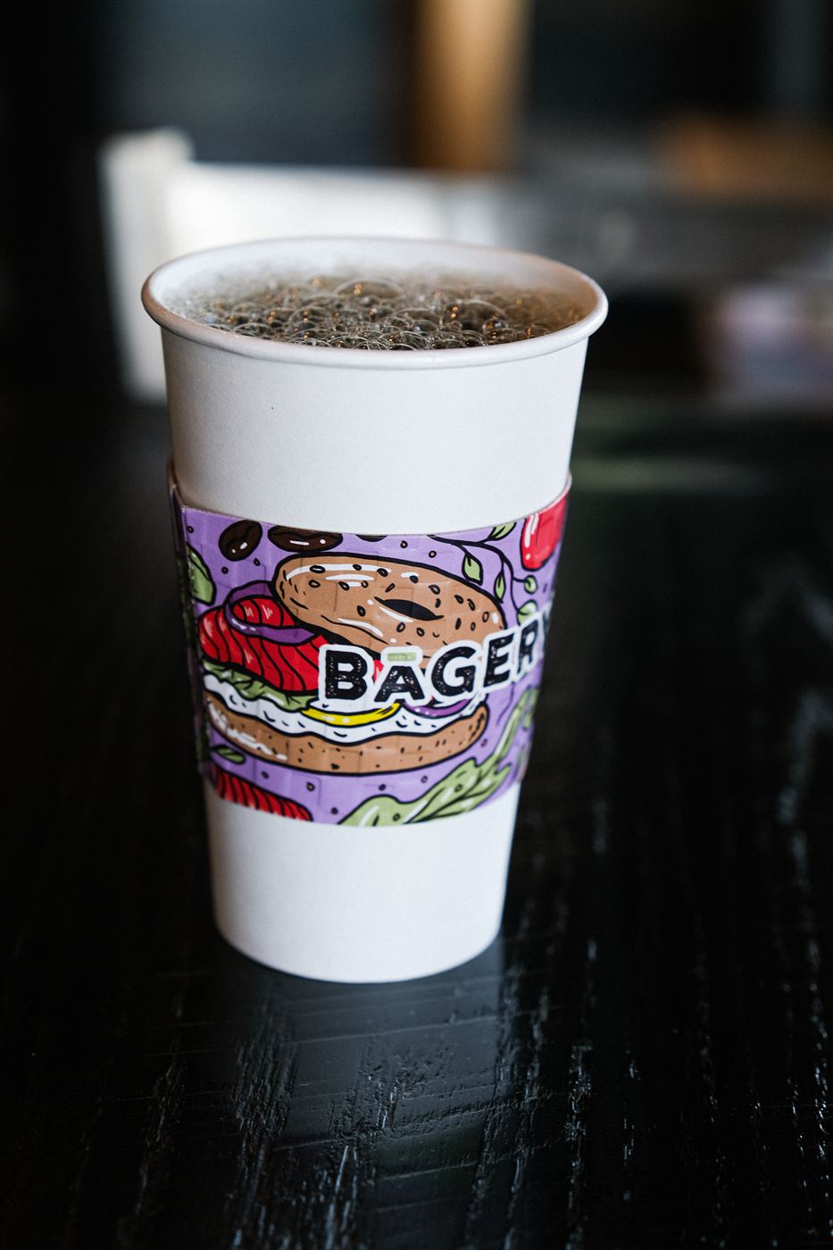 Hot coffee in a Bāgery cup